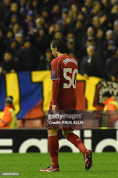Liverpool's Serbian midfielder Lazar Markovic leaves the field after being sent off during the UEFA Champions League group B football match between...