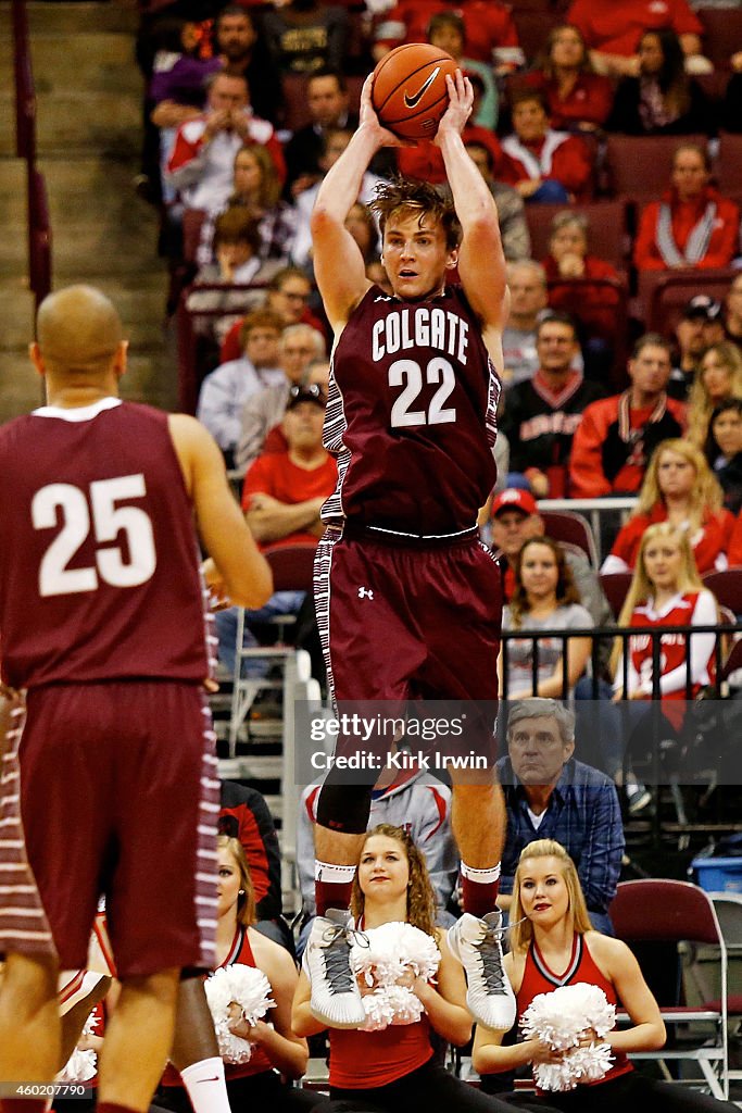Matthew Colgate Matt McMullen of the Colgate Raiders throws a pass to a teammate ...