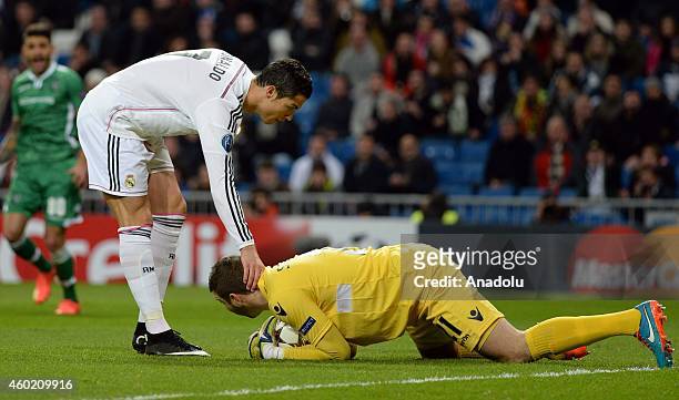 Real Madrid's forward Cristiano Ronaldo touches the nape of Ludogorets' goalkeeper Vladislav Stoyanov during the UEFA Champions League Group B...