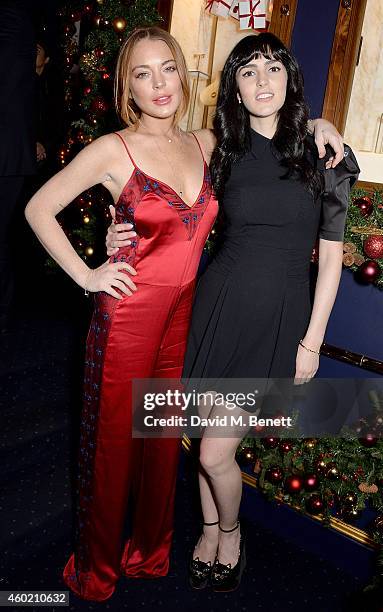 Lindsay and Ali Lohan attend the Sunday Times Style Xmas Party at Tramp on December 9, 2014 in London, England.