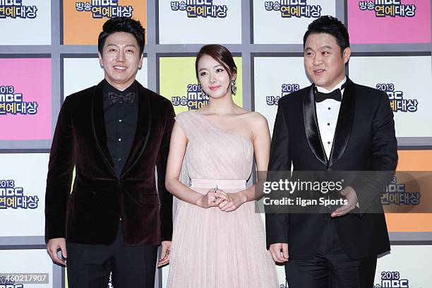 Kim Su-Ro, So E-Hyun and Kim Goo-Ra arrive at the red carpet of the 2013 MBC entertainment awards at MBC Open hall on December 29, 2013 in Seoul,...