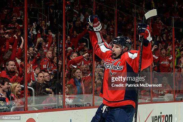 Troy Brouwer of the Washington Capitals celebrates after scoring a goal in the second period during an NHL game against the Carolina Hurricanes at...