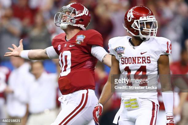 McCarron of the Alabama Crimson Tide celebrates after throwing a touchdown pass against the Oklahoma Sooners during the Allstate Sugar Bowl at the...