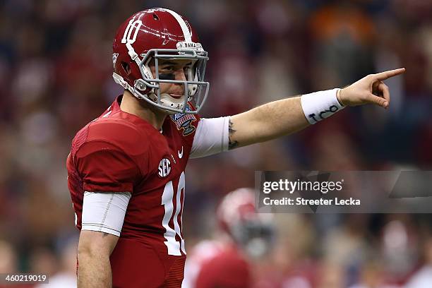 McCarron of the Alabama Crimson Tide calls a play against the Oklahoma Sooners during the Allstate Sugar Bowl at the Mercedes-Benz Superdome on...