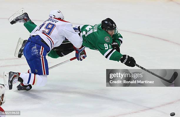 Tyler Seguin of the Dallas Stars takes a shot on goal while defended by Andrei Markov of the Montreal Canadiens in the second period at American...