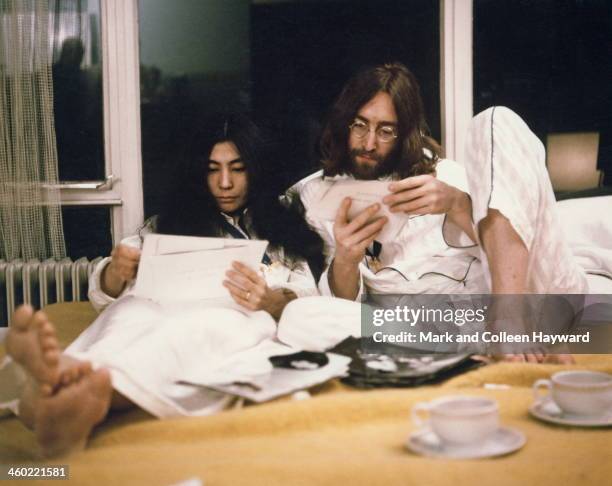 1st MARCH: Married musicians Yoko Ono and John Lennon during their 'Bed-In' in the Presidential suite of the Hilton hotel in Amsterdam, Netherlands...