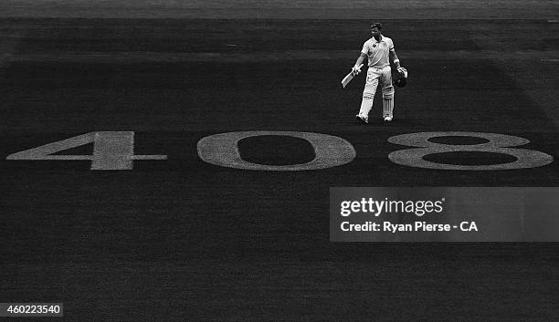 Steve Smith of Australia celebrates after reaching his century over the Test Cap number '408' tribute to the late Phil Hughes during day two of the...