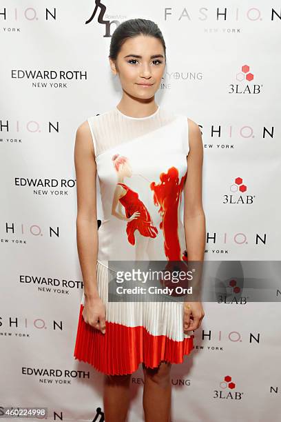 Model Julia Mashen wearing Edward Roth poses for a photo at The 2nd Annual NBA, NFL and MLB Wives Holiday Soiree, in support of benevolent charity,...