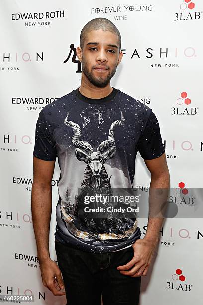 Model wearing Edward Roth poses for a photo at The 2nd Annual NBA, NFL and MLB Wives Holiday Soiree, in support of benevolent charity, "Dress For...