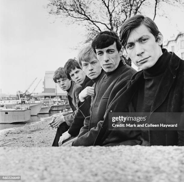 English rock and roll group The Rolling Stones on Chelsea Embankment in London, UK, 4th May 1963. Left to right: Mick Jagger, Keith Richards, Brian...