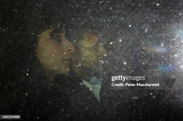 Shrien Dewani leaves Gatwick airport on December 10, 2014 in Crawley, United Kingdom. Mr Dewani has returned from South Africa after he was cleared...