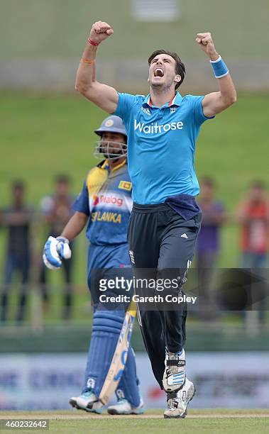 Steven Finn of England celebrates dismissing Kusal Perera of Sri Lanka during the 5th One Day International between Sri Lanka and England at...