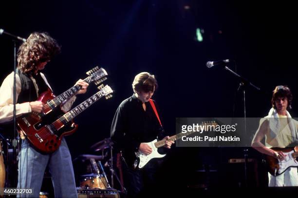 British musicians Jimmy Page, Eric Clapton, and Jeff Beck perform on stage during an ARMS Charity Concert, Dallas, Texas, November 27, 1983.