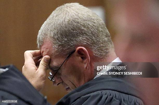 Prosecutor Gerrie Nel reacts as Judge Thokozile Masipa delivers judgement during the appeal by prosecutors against the verdict and sentence of South...