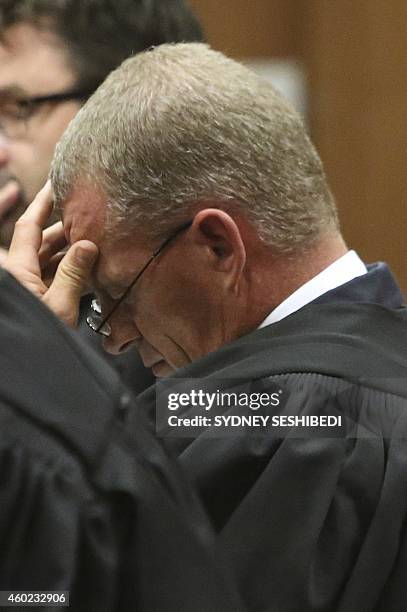 Prosecutor Gerrie Nel reacts as Judge Thokozile Masipa delivers judgement during the appeal by prosecutors against the verdict and sentence of South...