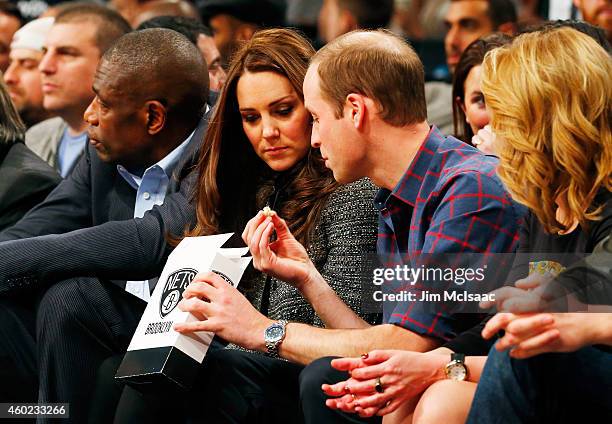 Prince William, Duke of Cambridge and Catherine, Duchess of Cambridge attend a game between the Brooklyn Nets and the Cleveland Cavaliers at Barclays...