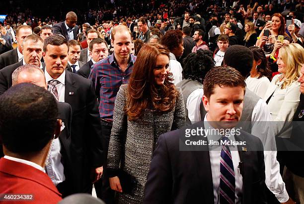 Prince William, Duke of Cambridge and Catherine, Duchess of Cambridge attend a game between the Brooklyn Nets and the Cleveland Cavaliers at Barclays...