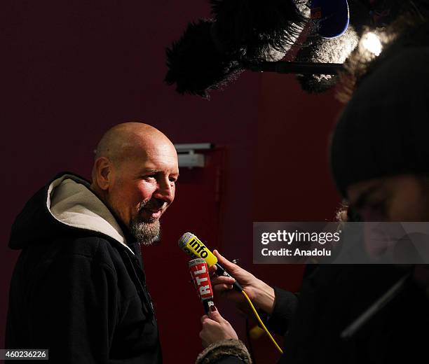 French former hostage Serge Lazarevic addresses media after landed in a French Republic plane at the Villacoublay military base near Paris on...