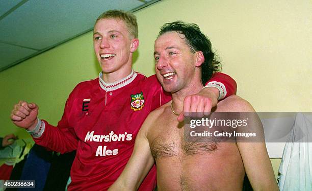 Wrexham goalscorers Steve Watkin and Mickey Thomas celebrate in the dressing room after League Division Four side Wrexham had beaten Division One...