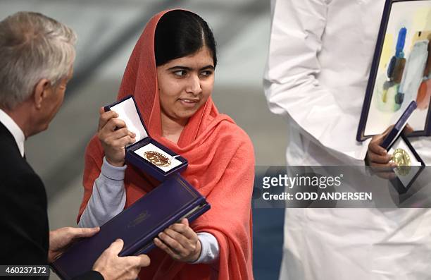 Nobel Peace Prize laureate Malala Yousafzai receives her Nobel Prize at the Nobel Peace Prize awarding ceremony at the City Hall in Oslo on December...