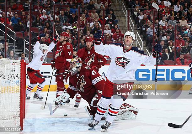 Umberger of the Columbus Blue Jackets celebrates after scoring a third-period power-play goal past goaltender Mike Smith of the Phoenix Coyotes...