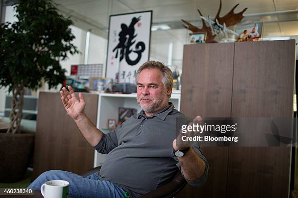 Eugene Kaspersky, founder and chief executive officer of Kaspersky Lab, gestures whilst speaking during an interview at his office in Moscow, Russia,...