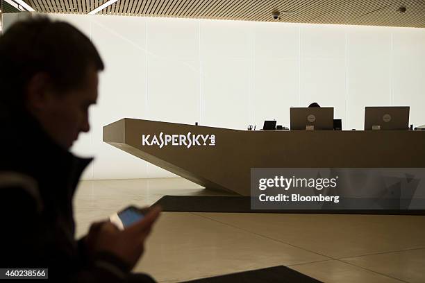 Logo sits illuminated on the reception desk at the headquarters of Kaspersky Lab, a cyber-security firm, in Moscow, Russia, on Tuesday, Dec. 9, 2014....