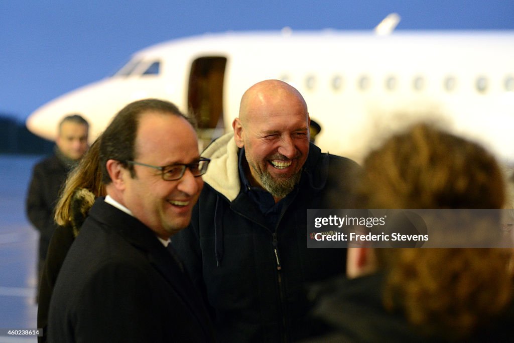 French President Francois Hollande Welcomes Serge Lazarevic, Former Hostage At Villacoublay