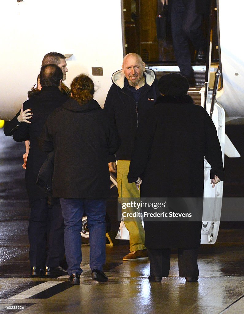 French President Francois Hollande Welcomes Serge Lazarevic, Former Hostage At Villacoublay