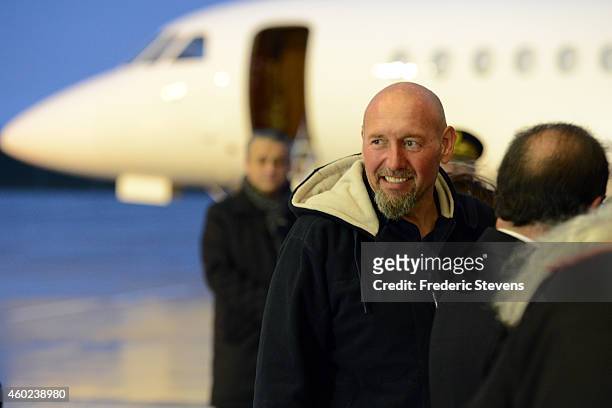 Former hostage, Serge Lazarevic is welcomed by French President Francois Hollande after landing at the Villacoublay military base near Paris on...