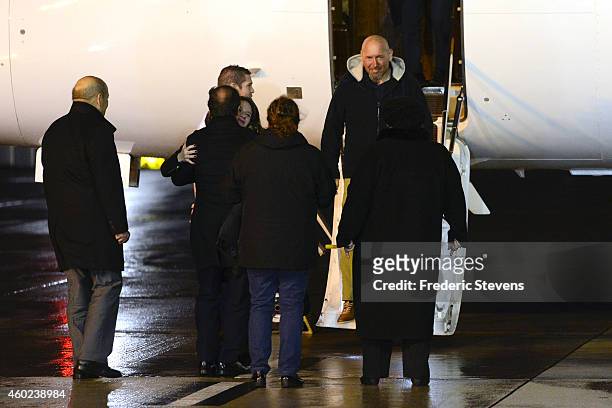 Former hostage, Serge Lazarevic is welcomed by French President Francois Hollande and family after landing at the Villacoublay military base near...
