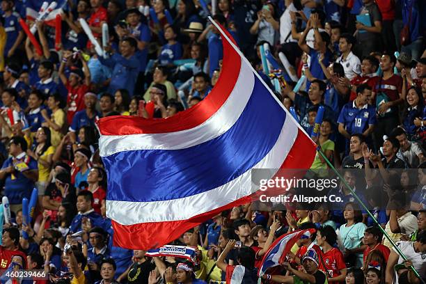 Thailand fans cheer during the 2014 AFF Suzuki Cup semi final 2nd leg match between Thailand and Philippines at the Rajamangala National Stadium on...