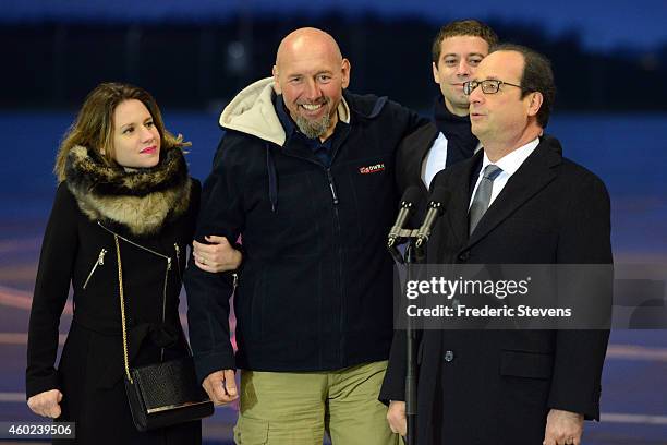 French President Francois Hollande speaks to the media and Welcomes former hostage, Serge Lazarevic with daughter Diane and Clement Verdon , son of...