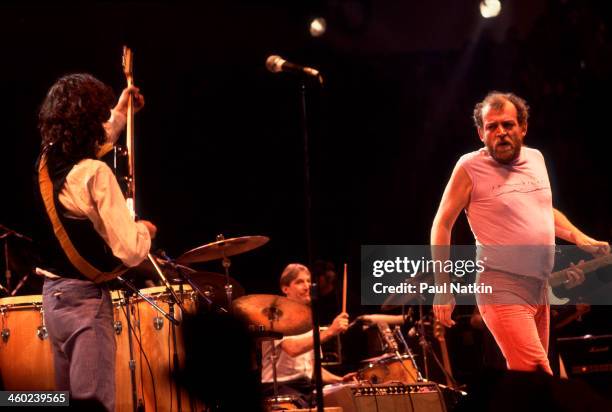 British musicians Jimmy Page, Charlie Watts, and Joe Cocker perform on stage during an ARMS Charity Concert, Dallas, Texas, November 27, 1983.