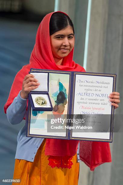 Malala Yousafzai accepts the Nobel Peace Prize Award during the Nobel Peace Prize ceremony at Oslo City Town Hall on December 10, 2014 in Oslo,...