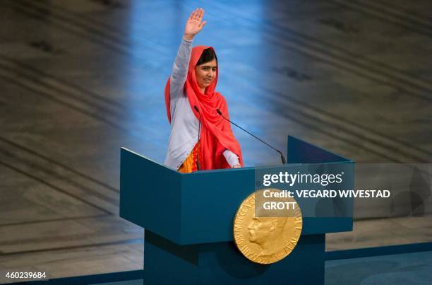 Nobel Peace Prize laureates Malala Yousafzai gestures after delivering her speech during the Nobel Peace Prize awarding ceremony at the City Hall in...