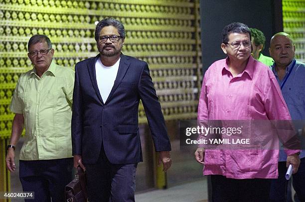 Commanders of the FARC-EP leftist guerrillas Pablo Catatumbo , Ivan Marquez and Rodrigo Granda arrive at the Convention Palace in Havana to attend...