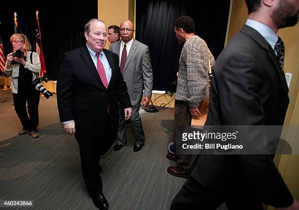 Detroit Mayor Mike Duggan leaves the room after holding a press conference to announce the end of the City of Detroit's emergency status and its exit...