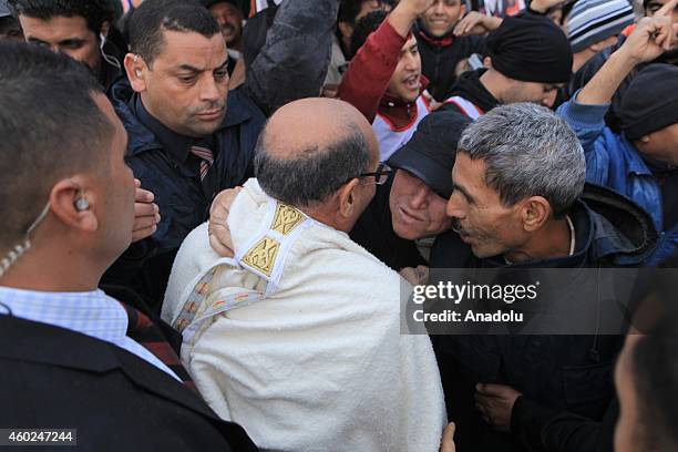 Tunisian presidential candidate Moncef Marzouki meets with people as a part of his election campaign for the presidential elections 2nd round to be...