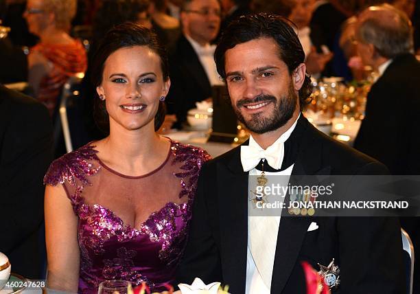 Prince Carl Philip of Sweden and his fiancee Sofia Hellqvist attend the Nobel banquet, a traditional dinner after the Nobel Prize awarding ceremony...