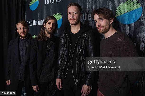 Ben McKee, Daniel Wayne Sermon, Dan Reynolds and Daniel Platzman of the band Imagine Dragons pose for a photo backstage during Deck The Hall Ball...