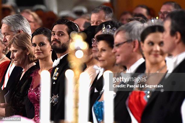 Sofia Hellqvist and Prince Carl Philip of Sweden attend the Nobel Prize Banquet 2014 at City Hall on December 10, 2014 in Stockholm, Sweden.