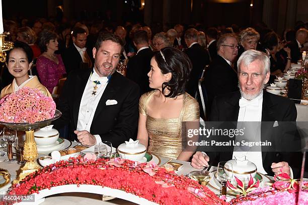 Christopher O'Neill and Professor John O'Keefe and Professor Jean Tirole attend the Nobel Prize Banquet 2014 at City Hall on December 10, 2014 in...