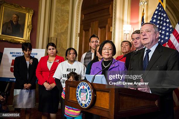 Sen. Dick Durbin , flanked by Sen. Mazie Hirono and immigration activists and supporters, speaks during a news conference to discuss U.S. President...