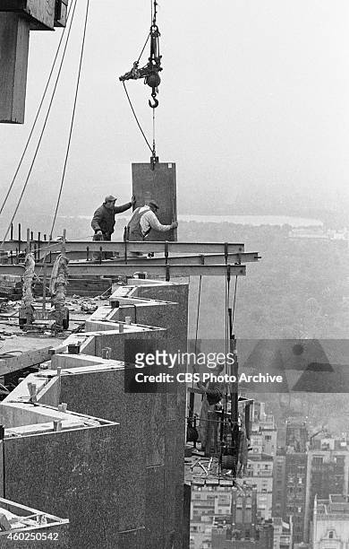 Photo coverage of construction at CBS headquarters , 51 West 52 Street, New York, NY. Day the last slab of black granite facing put into place at...