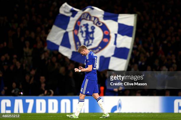 Andre Schuerrle of Chelsea celebrates after scoring his team's second goal during the UEFA Champions League group G match between Chelsea and...