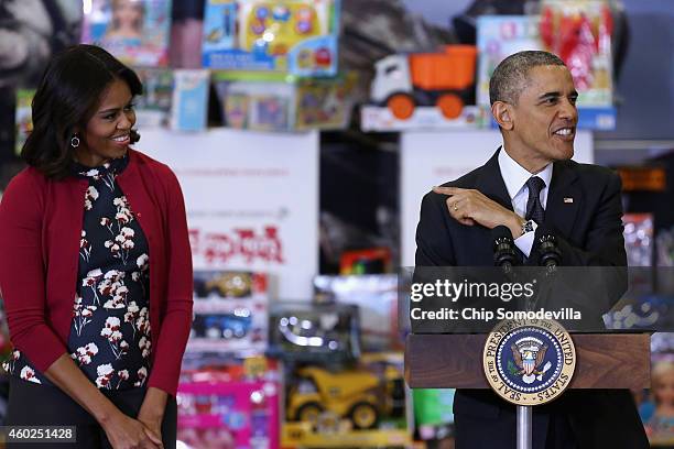 President Barack Obama and first lady Michelle Obama deliver remarks before sorting toys and gifts donated by Executive Office of the President staff...