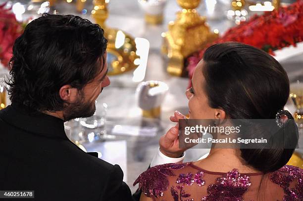 Sofia Hellqvist and Prince Carl Philip of Sweden attend the Nobel Prize Banquet 2014 at City Hall on December 10, 2014 in Stockholm, Sweden.