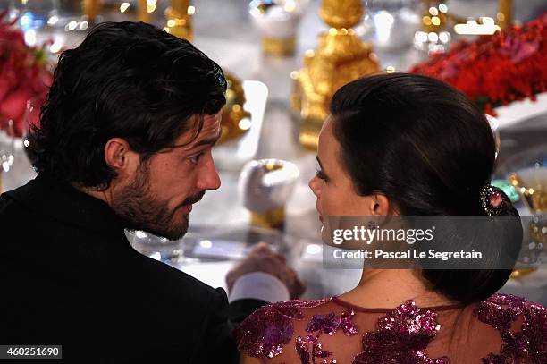 Sofia Hellqvist and Prince Carl Philip of Sweden attend the Nobel Prize Banquet 2014 at City Hall on December 10, 2014 in Stockholm, Sweden.
