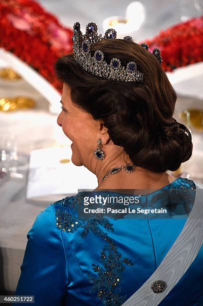 Queen Silvia of Sweden attends the Nobel Prize Banquet 2014 at City Hall on December 10, 2014 in Stockholm, Sweden.